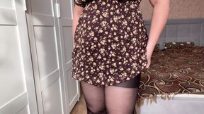 Beauty in sexy pantyhose poses and caresses her holes to orgasm