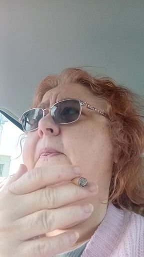 BBW smoking in pink sweater in her car talking to her fans