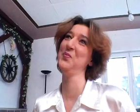 A super hot lady from Germany tickling her pussy with her dildo