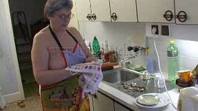 Fat woman with big boobs fucks her pussy with her sex toy