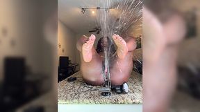 Hot ebony girl with huge ass enjoys stretching her pussy with big dildo attached to a fucking machine until she starts squirting like a fountain