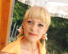 Cute German blonde rides dick in front of the A-frame house