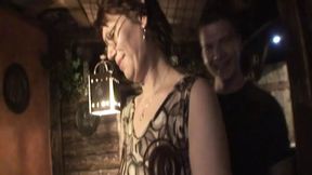 Young guy fucks mature lady on pub table